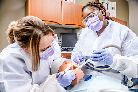 Students Practice their Dental Assisting Skills at Remington College